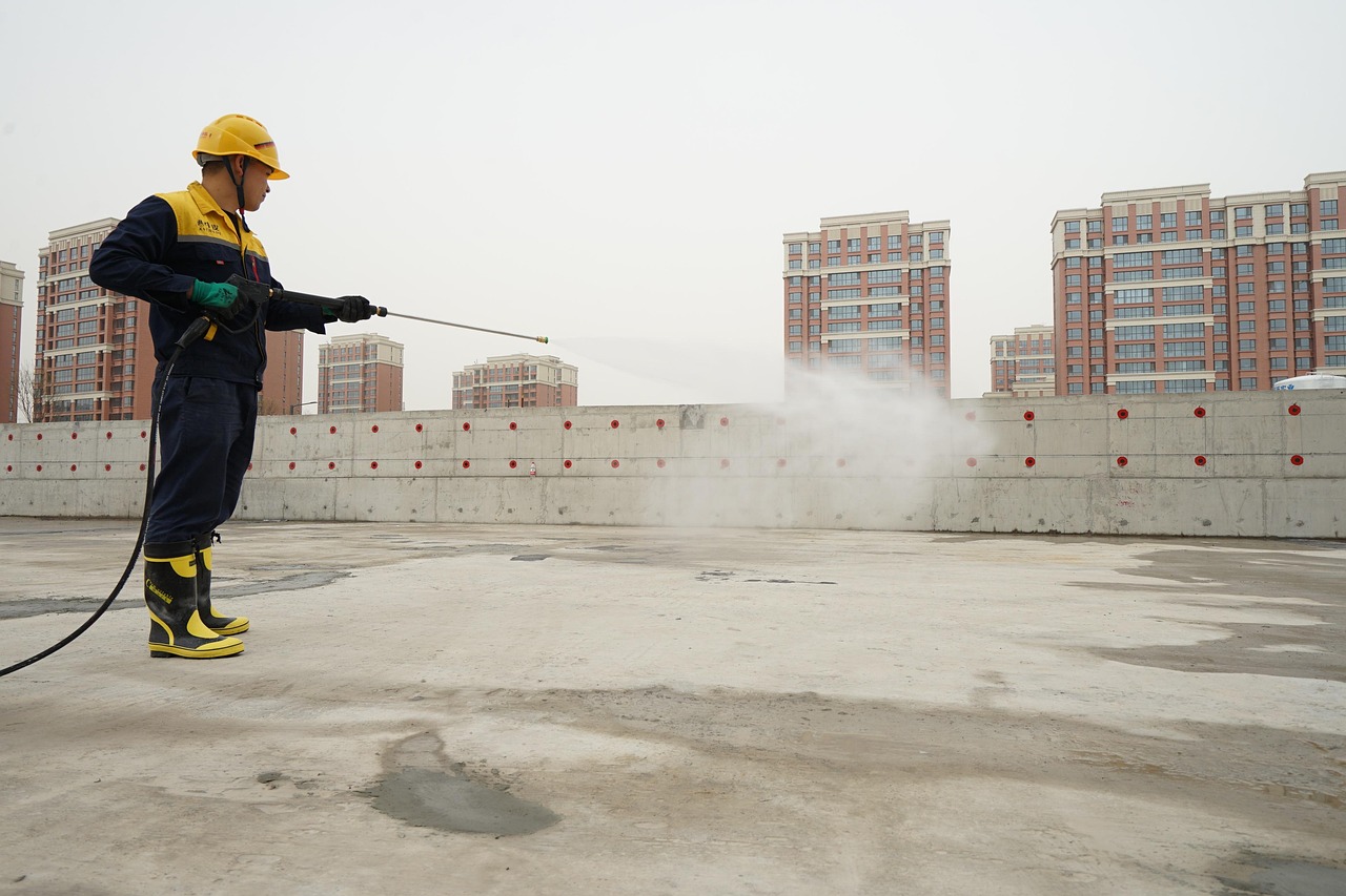 why-choose-us waterproofing, workers, construction site, roof top, men, working, spraying, safety gear, pressure spray, waterproofing, waterproofing, waterproofing, waterproofing, waterproofing